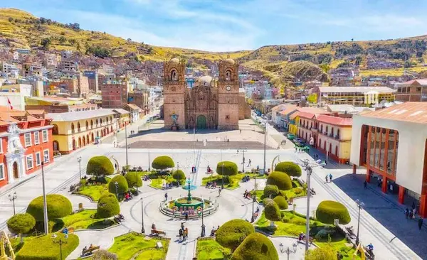 The vibrant main square of Puno, the gateway to Lake Titicaca.