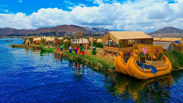 Brightly decorated boats navigating the waters of Lake Titicaca.